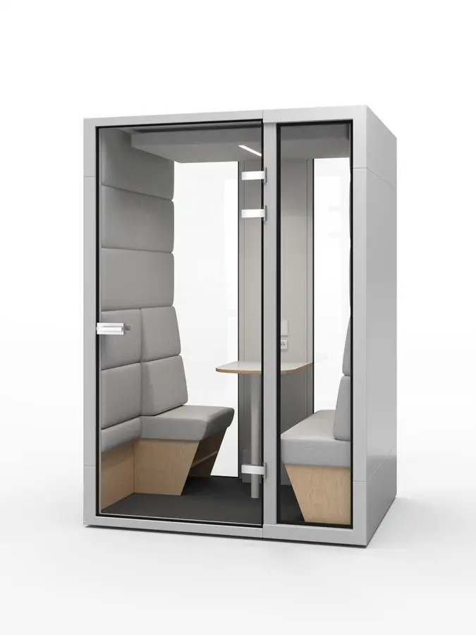 M3 cabin for 3-person meetings — comfortable seats with grey upholstery and wall finish